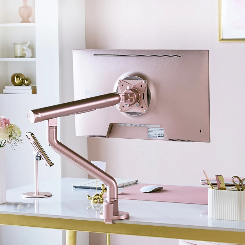 Stylish desk with pink gold monitor arm