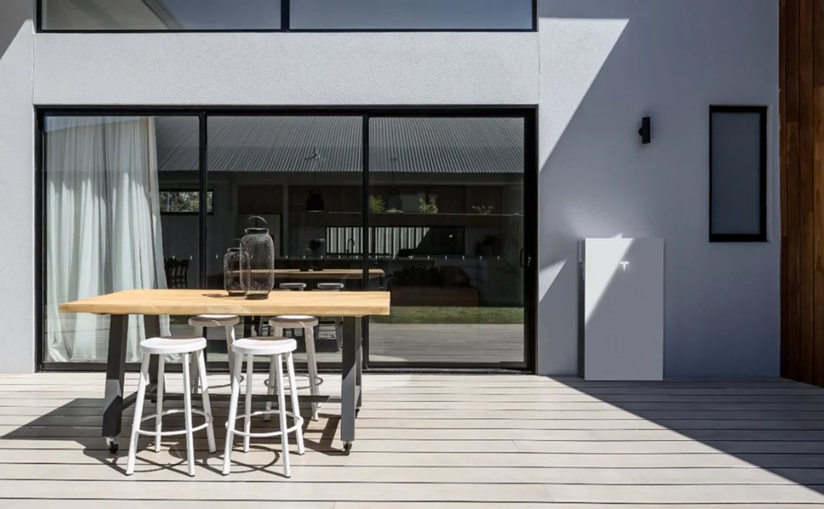 Tesla Powerwall 3 installed in a modern home's patio