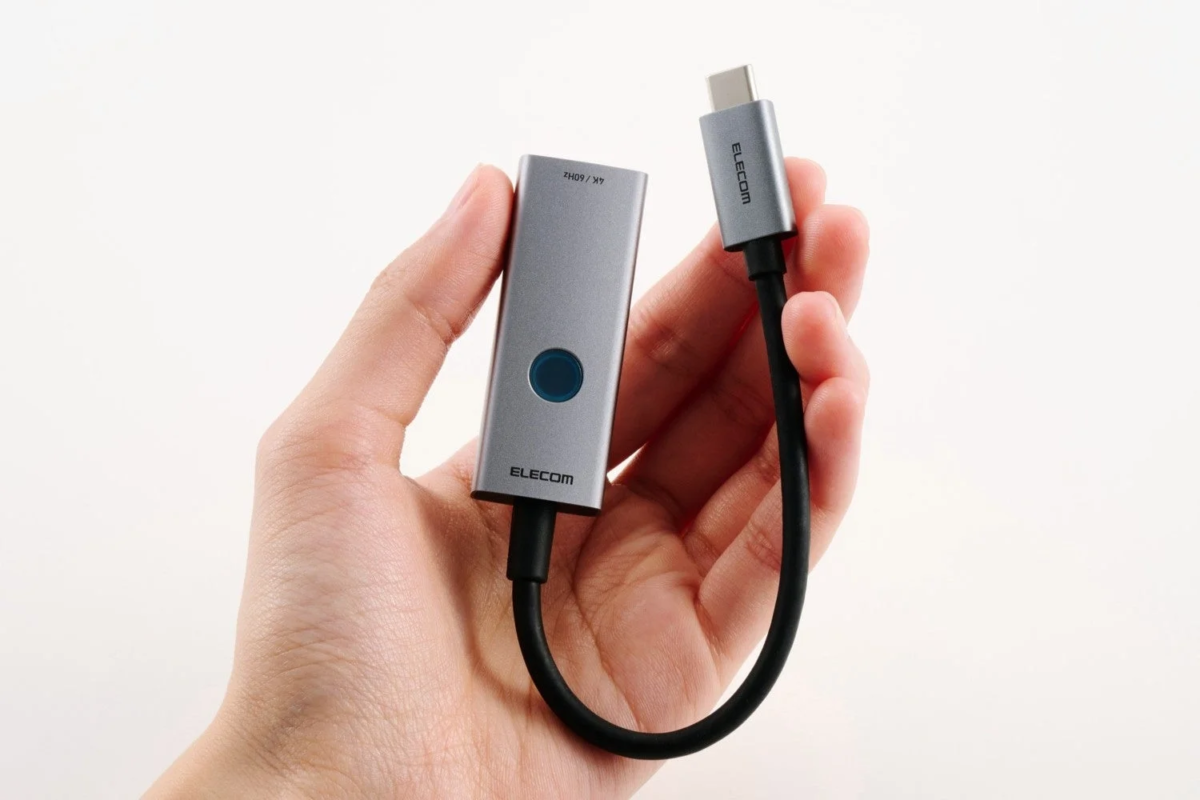 Close-up of the adapter with the button