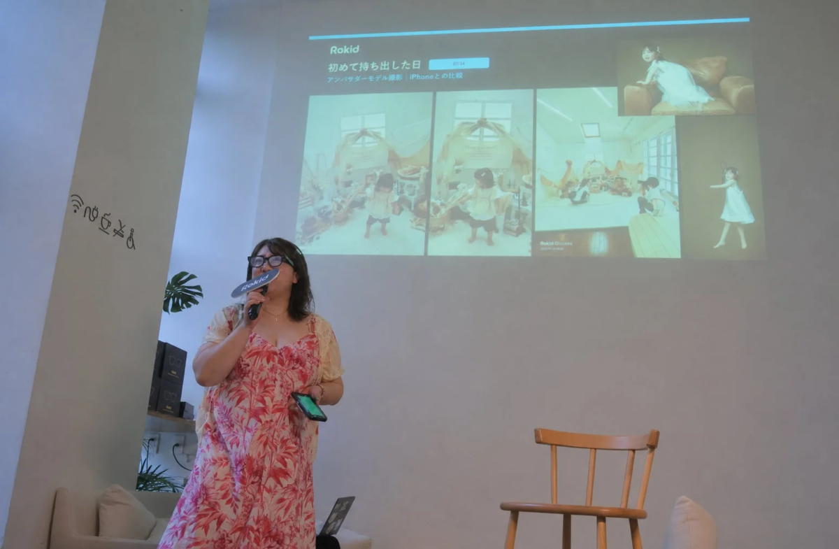 Woman presenting Rokid Glasses