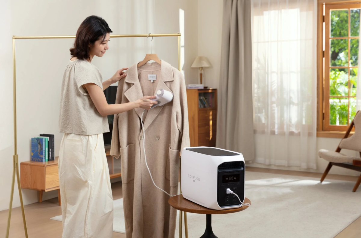 Woman steaming clothes with EcoFlow DELTA 3 Max