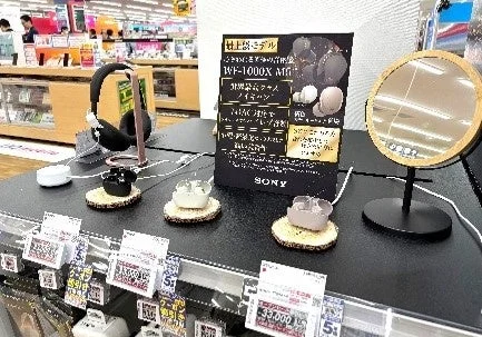 Image of an appliance display with Sony headphones and earphones