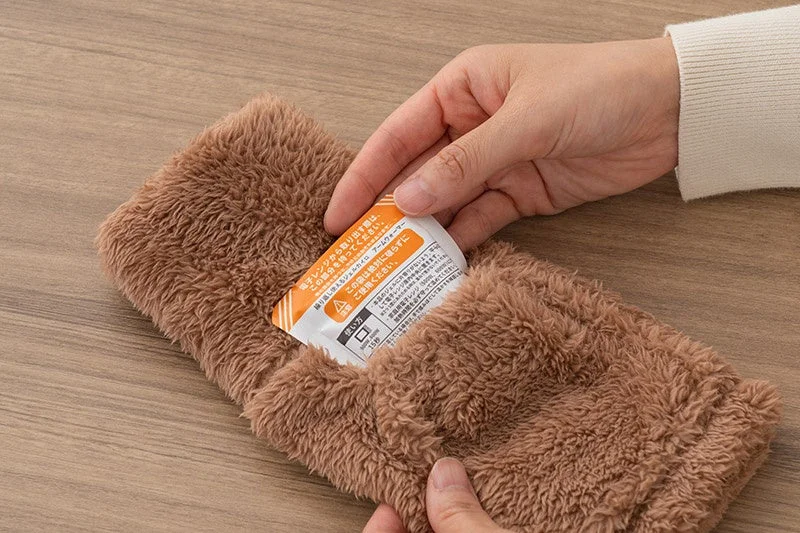 Inserting Gel into Arm Warmer