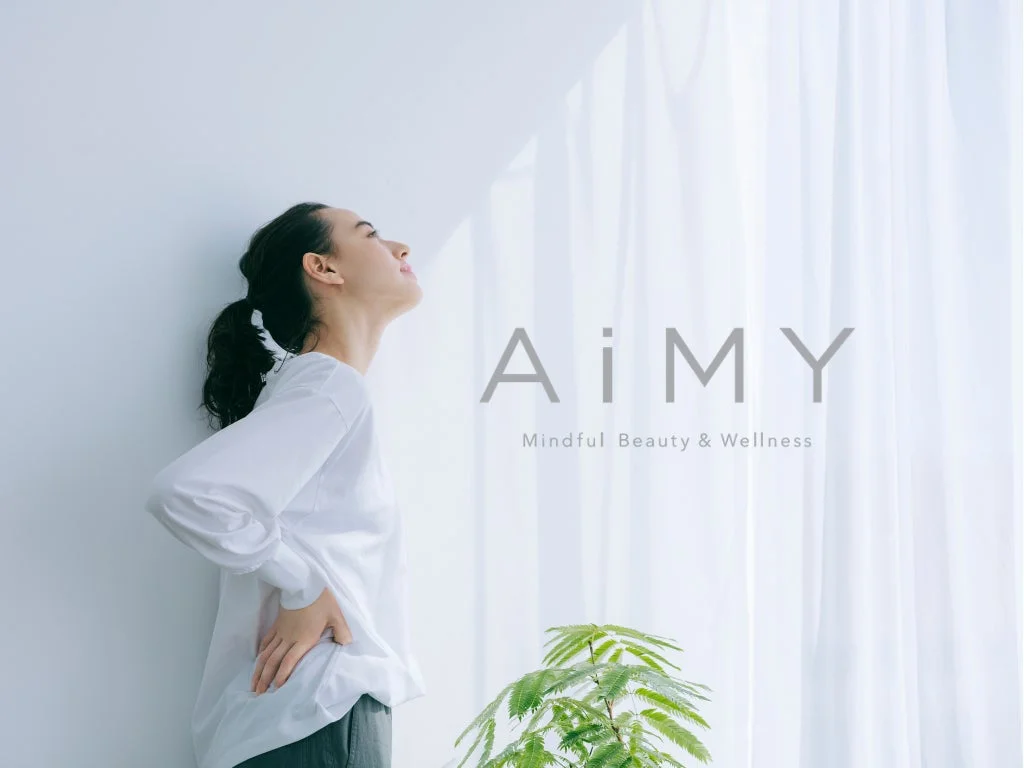 Woman looking up, symbolizing wellness