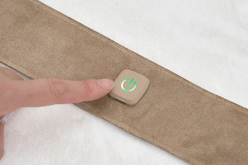 Temperature adjustment button for waist warmer