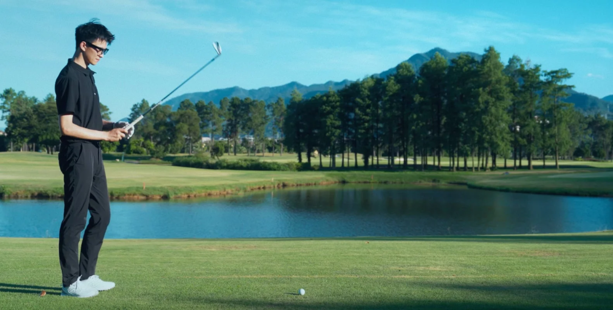 Man golfing, showing first-person view potential