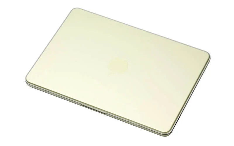 Closed gold MacBook