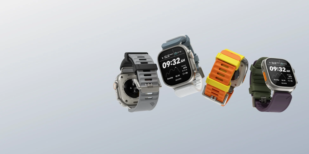 Multiple smartwatches with different colored bands